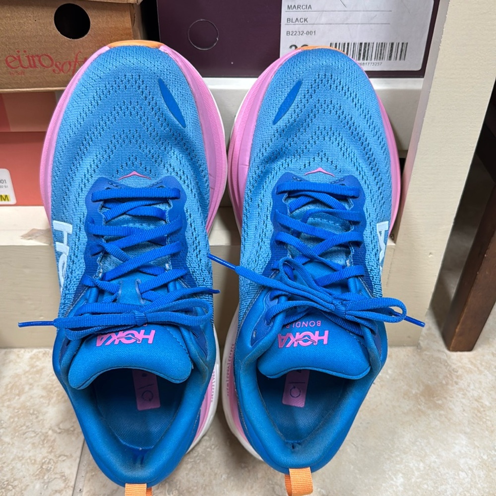 Hoka One One Bondi 8 Women’s Vibrant Blue with pink and white soles Sneakers